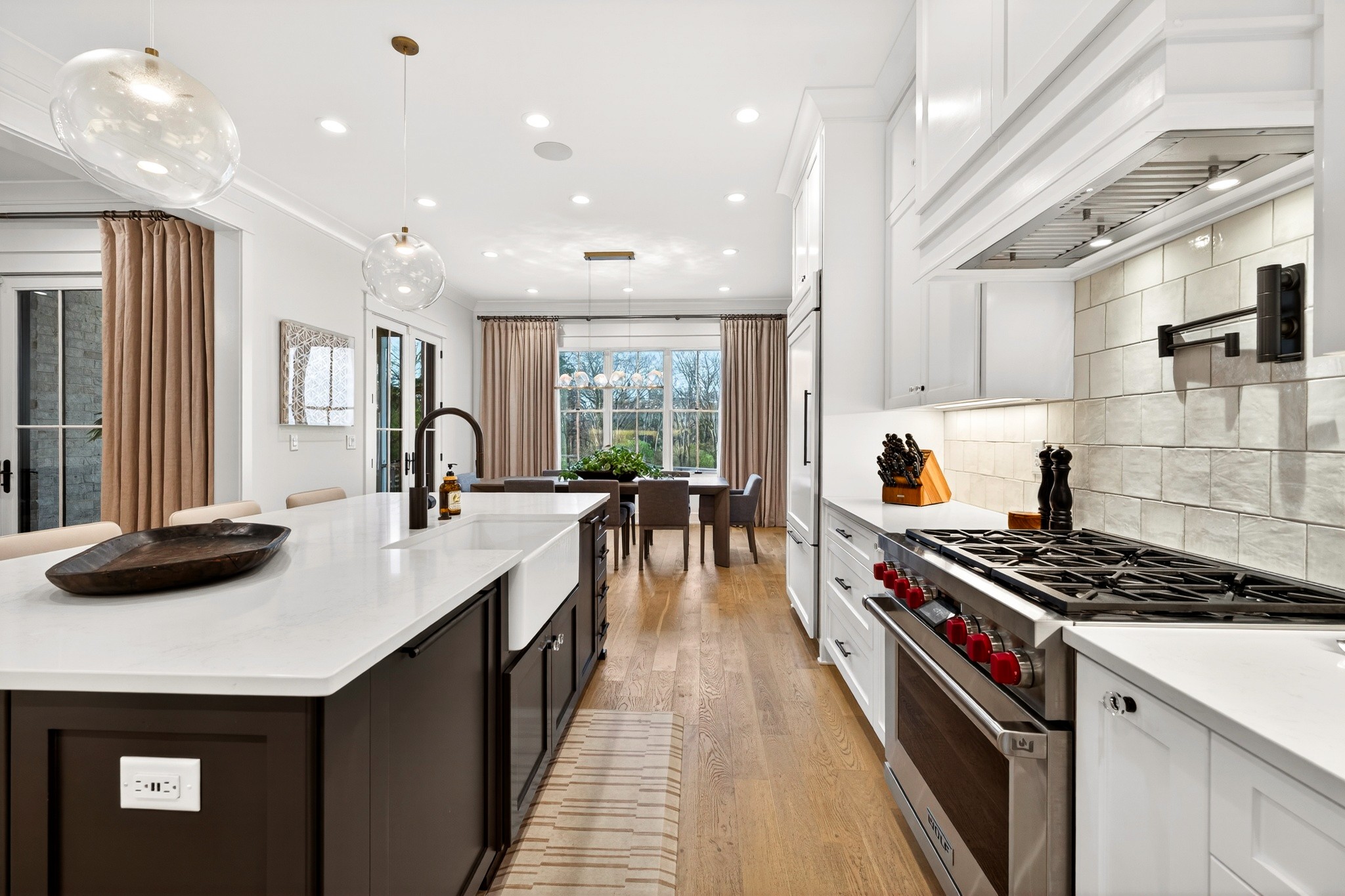 721 Newberry Road Nashville, TN 37205 - Photo 15 of 49 a kitchen with stainless steel appliances a sink stove and cabinets