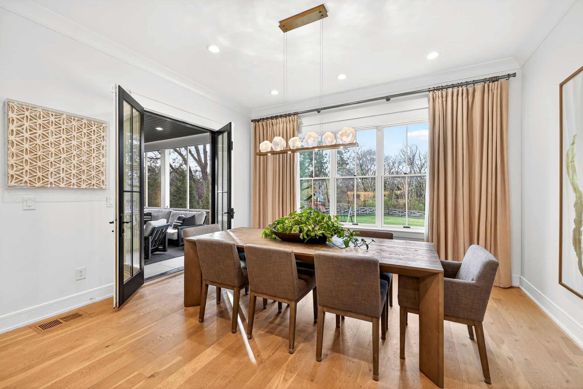 721 Newberry Road Nashville, TN 37205 - Photo 16 of 49 a dining room with furniture and wooden floor