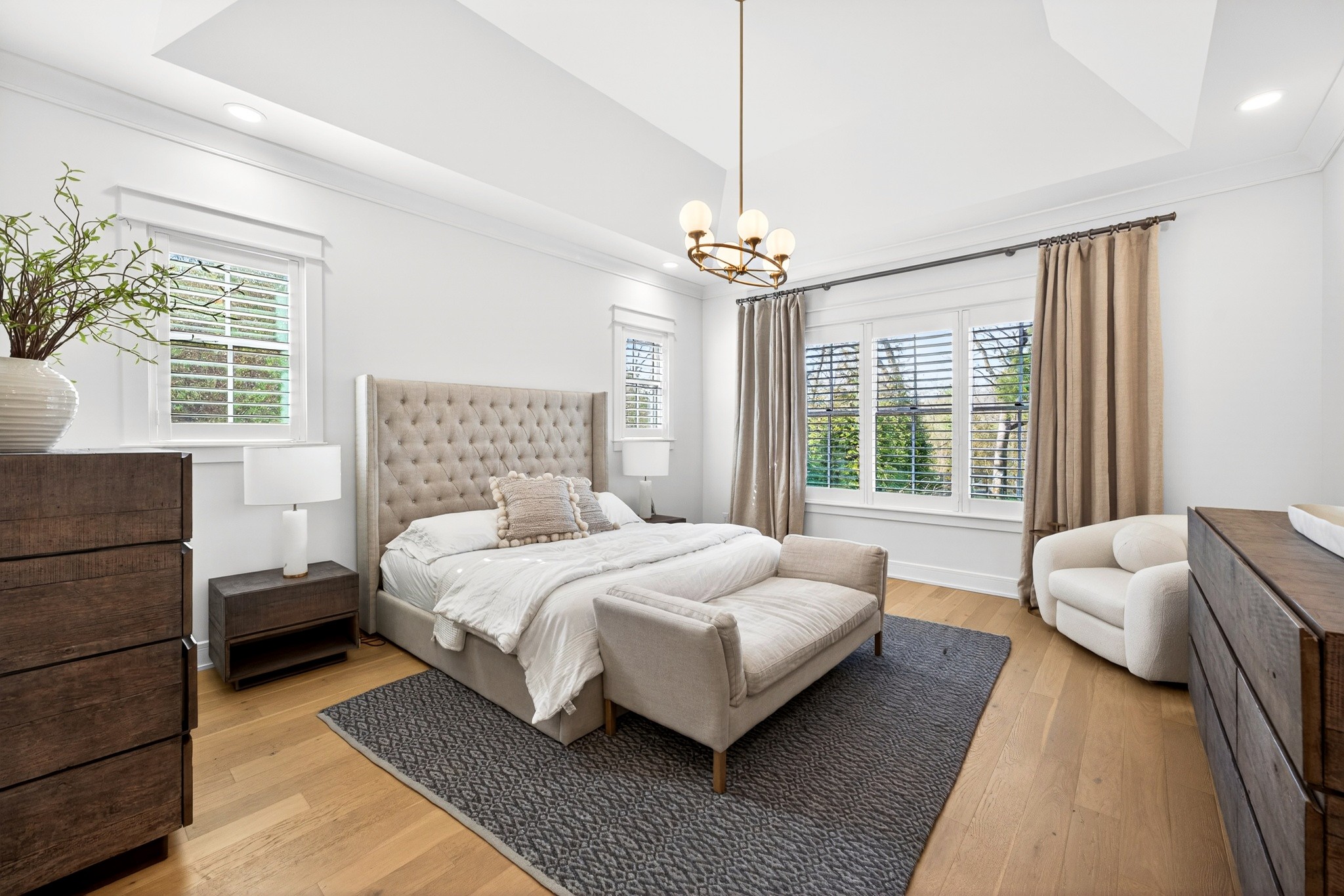 721 Newberry Road Nashville, TN 37205 - Photo 22 of 49 a bedroom with a bed chandelier and windows