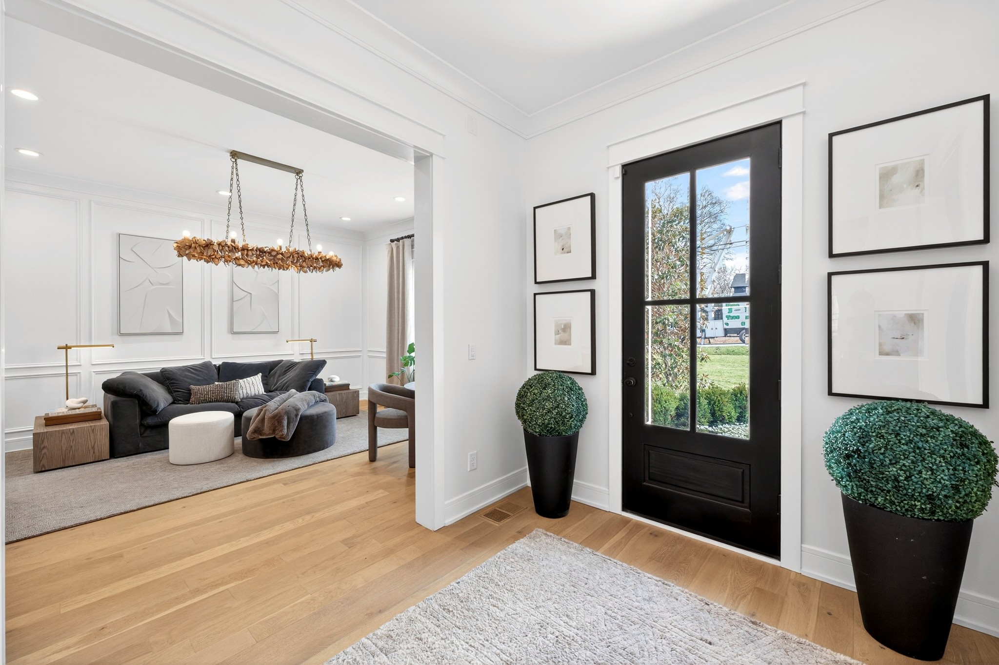721 Newberry Road Nashville, TN 37205 - Photo 3 of 49 a living room with furniture and a potted plant