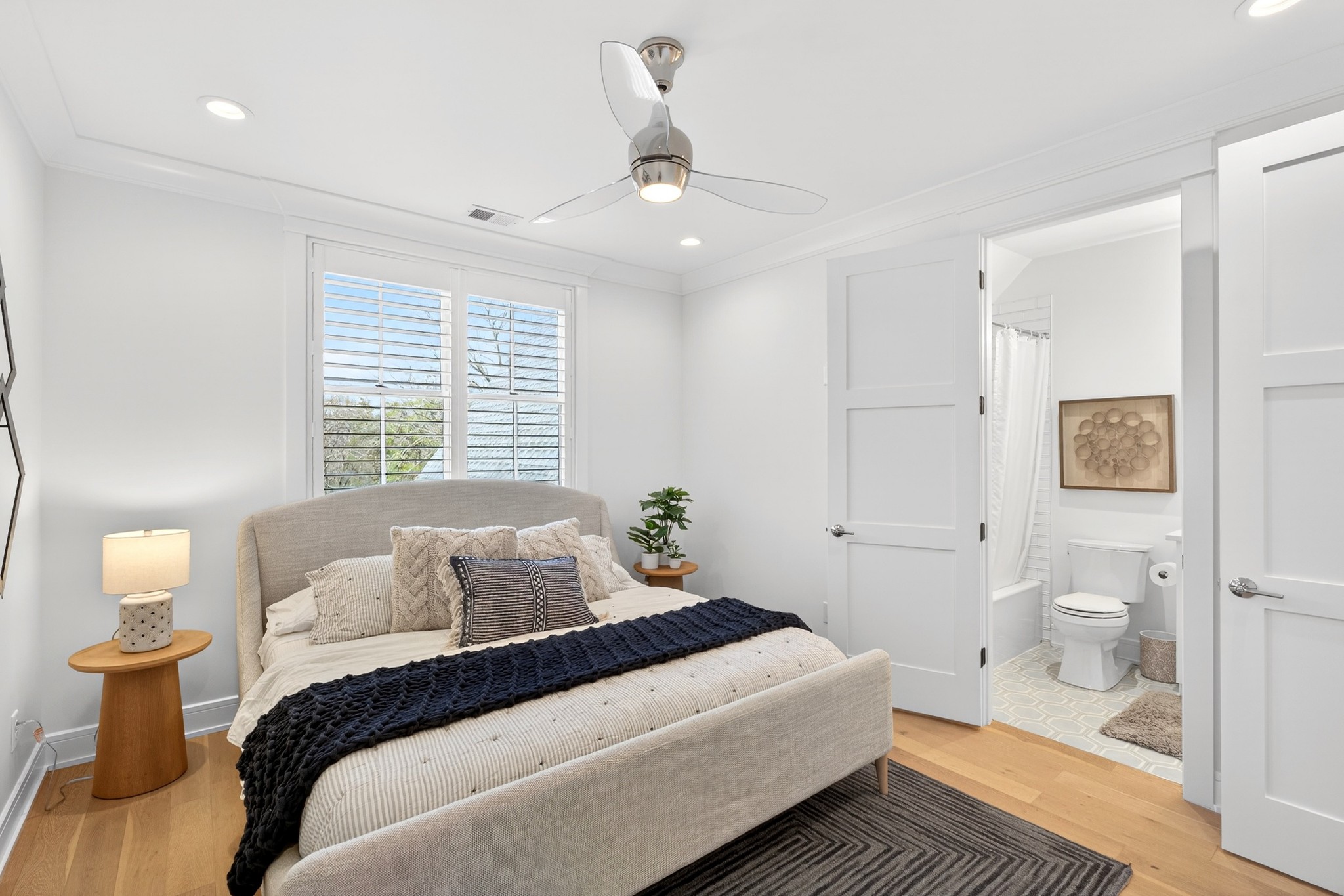 721 Newberry Road Nashville, TN 37205 - Photo 33 of 49 a spacious bedroom with a bed and a lamp