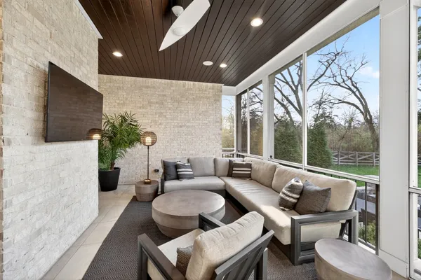 a outdoor living space with patio furniture and a potted plant
