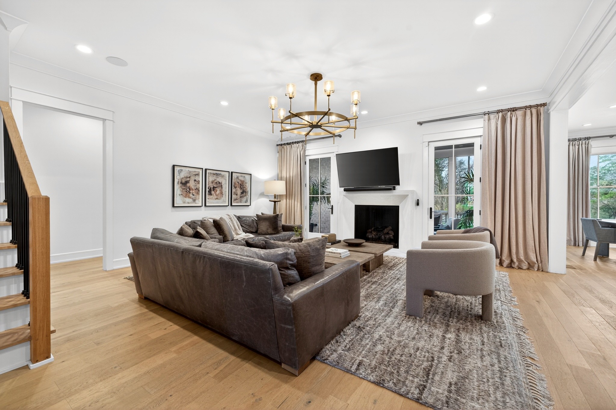 721 Newberry Road Nashville, TN 37205 - Photo 9 of 49 a living room with furniture a fireplace and a flat screen tv