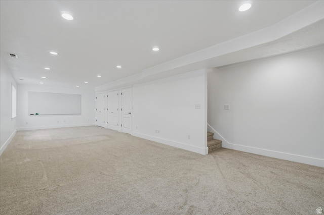 791 East Saddle Road Grantsville, UT 84029 - Photo 28 of 46 Spacious room featuring light carpet flooring and white walls