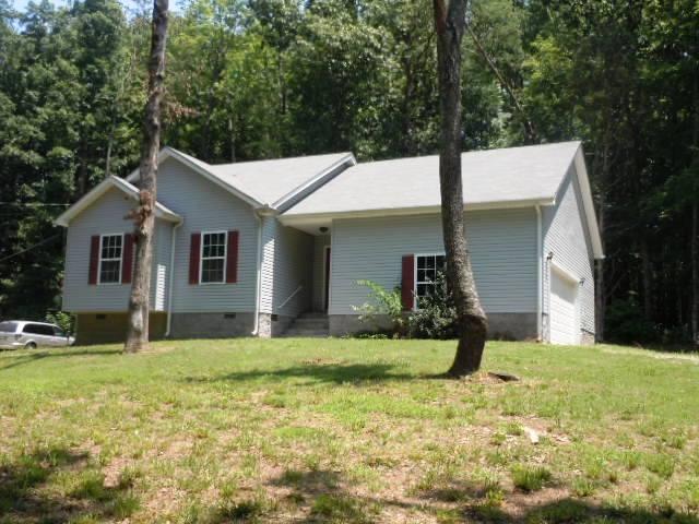 1051 Hogan Road Burns, TN 37029 - Photo 1 of 20 Home sits back off Hogan Road Nestled in the Trees