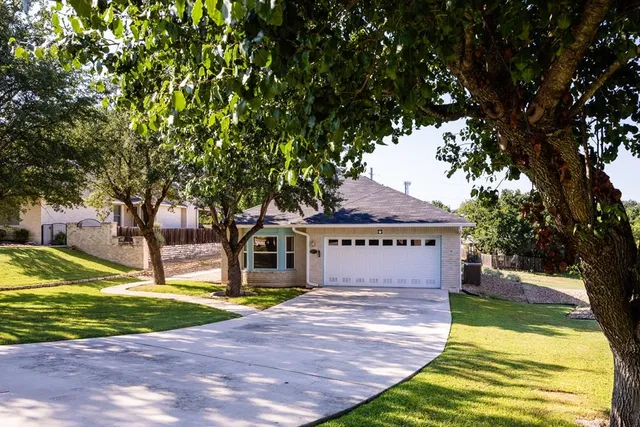 a sign board with yard in front of it
