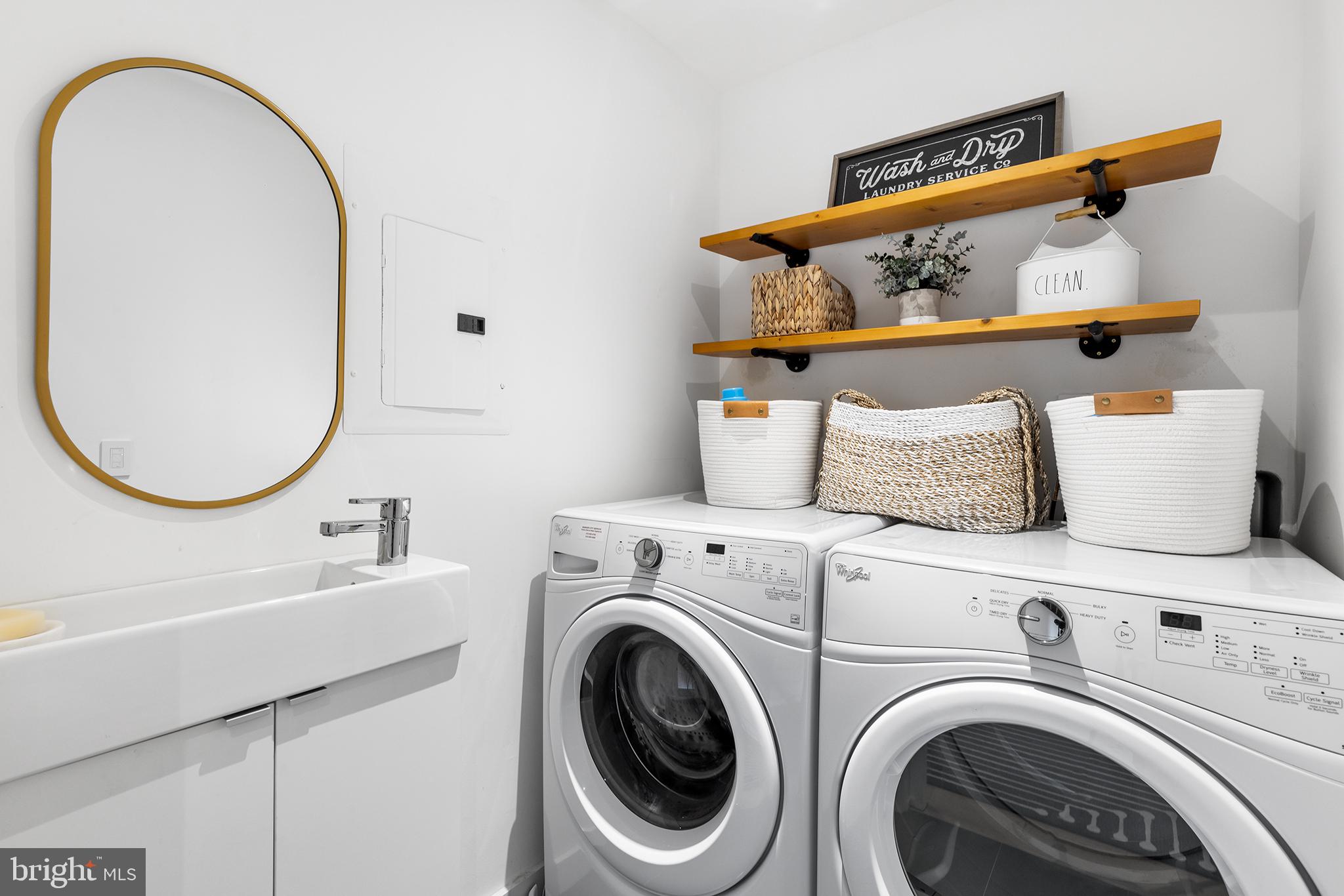 1124 Shackamaxon Street, Unit 8 Philadelphia, PA 19125 - Photo 21 of 41 a utility room with dryer and washer