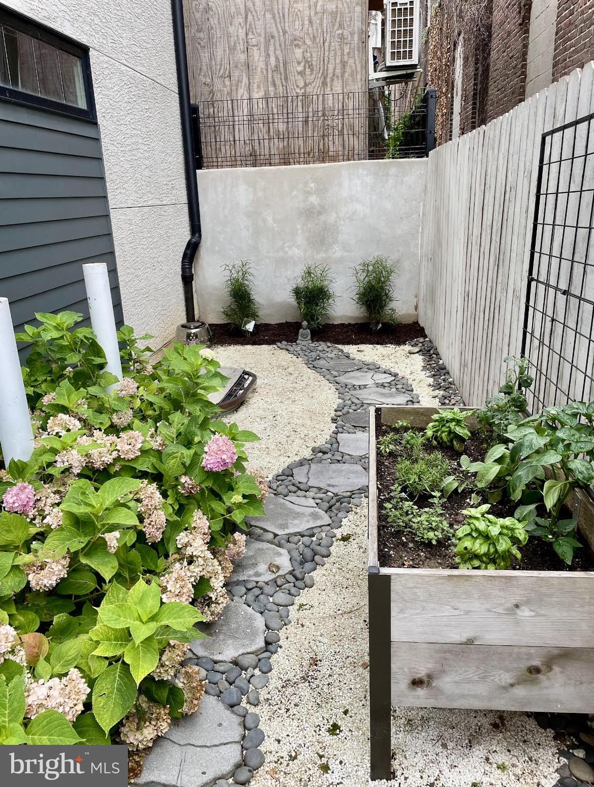 1124 Shackamaxon Street, Unit 8 Philadelphia, PA 19125 - Photo 40 of 41 a view of a garden with pathway