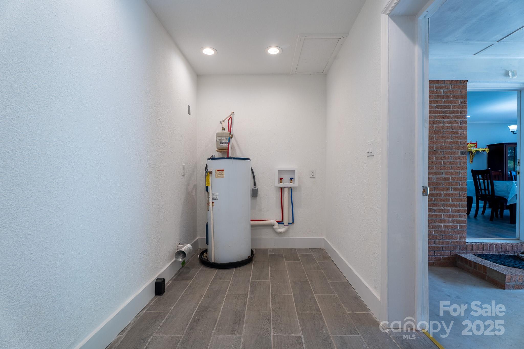 584 Southside Church Road Lincolnton, NC 28092 - Photo 11 of 28 a view of a storage & utility room with two washing machine