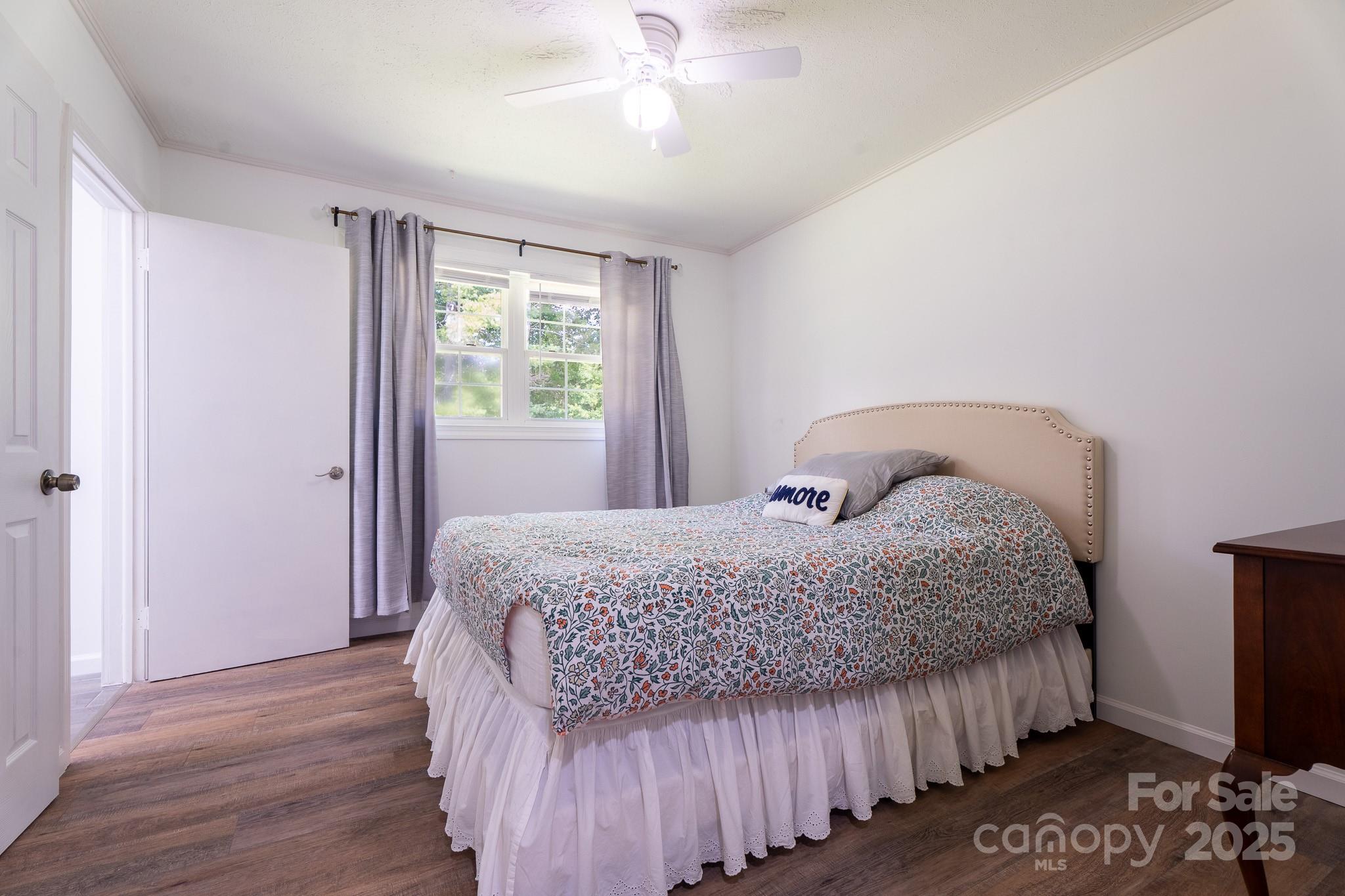 584 Southside Church Road Lincolnton, NC 28092 - Photo 13 of 28 a bedroom with a bed and a window
