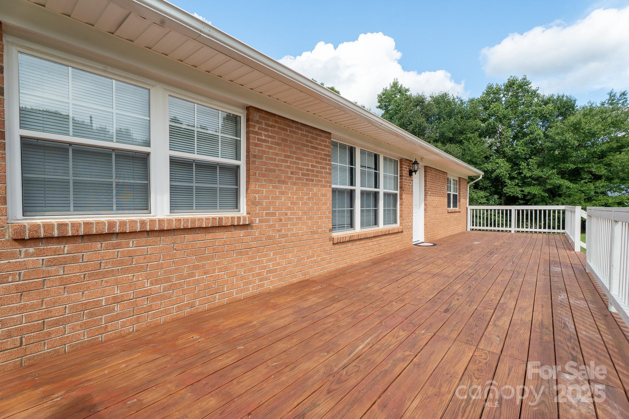 584 Southside Church Road Lincolnton, NC 28092 - Photo 23 of 28 a view of house with deck and wooden floor