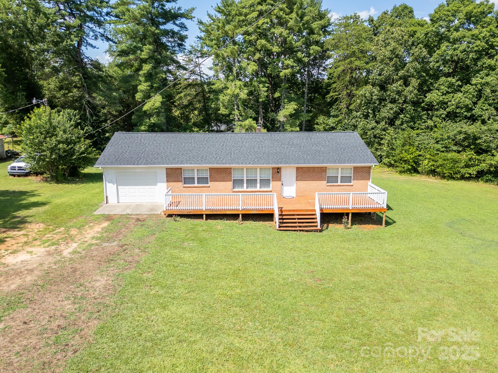584 Southside Church Road Lincolnton, NC 28092 - Photo 25 of 28 a house view with a garden space
