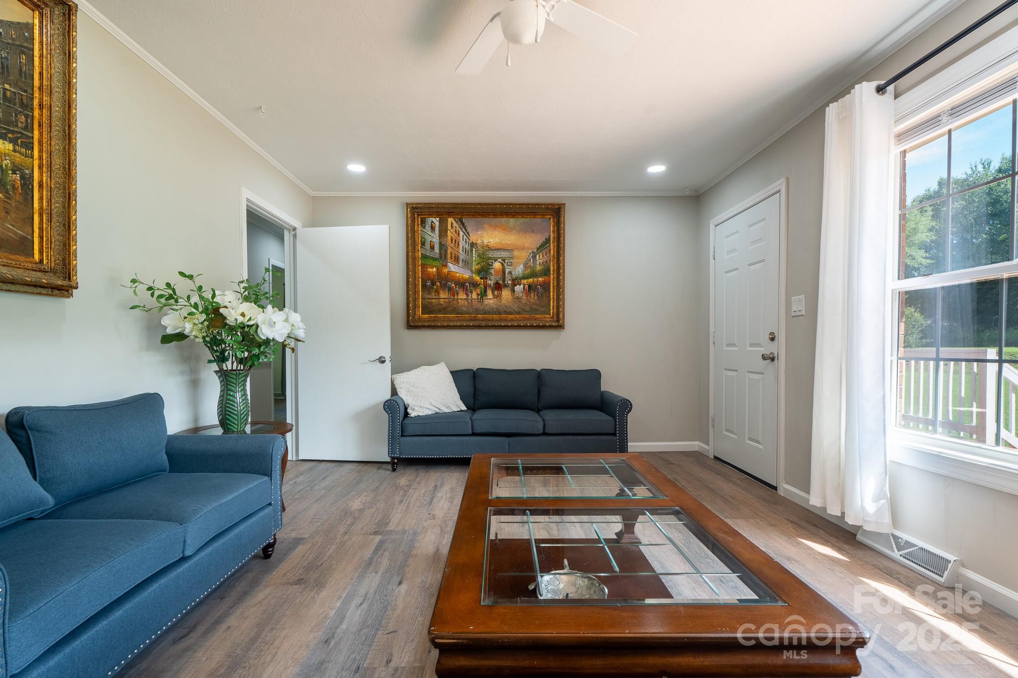 584 Southside Church Road Lincolnton, NC 28092 - Photo 9 of 28 a living room with furniture and a rug