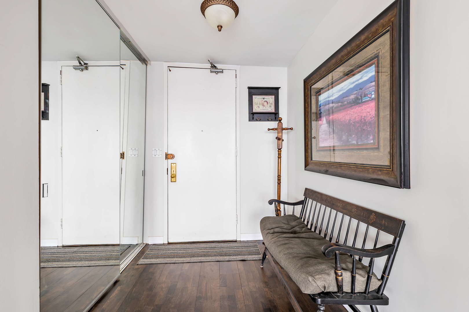 655 West Irving Park Road, Unit 4103 Chicago, IL 60613 - Photo 14 of 25 a view of an entryway with wooden floor