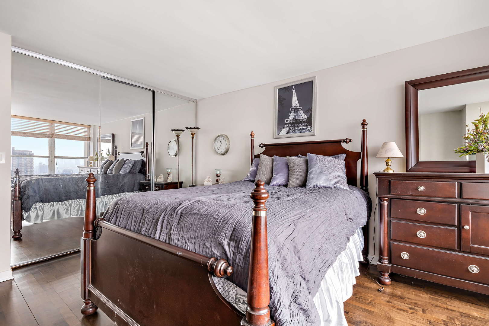 655 West Irving Park Road, Unit 4103 Chicago, IL 60613 - Photo 16 of 25 a bedroom with a bed and a dresser