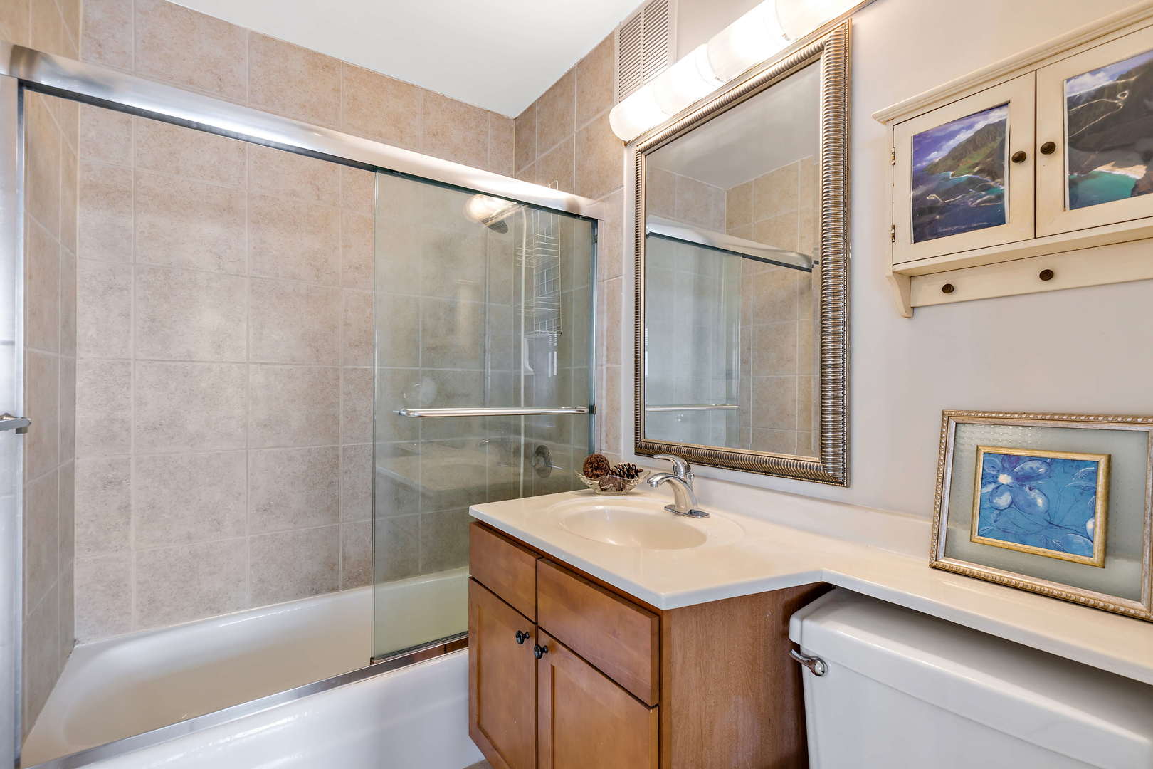 655 West Irving Park Road, Unit 4103 Chicago, IL 60613 - Photo 17 of 25 a bathroom with a sink and a mirror