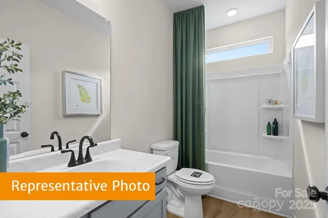 a bathroom with a sink a toilet and a bathtub