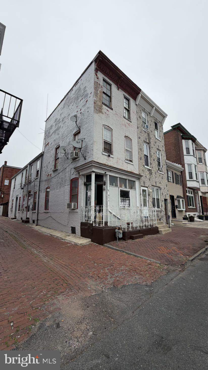 911 Walnut Street Reading, PA 19601 - Photo 4 of 6 a view of a building with a yard