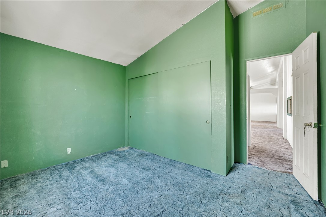 4361 Maple Road Pahrump, NV 89048 - Photo 23 of 46 A spacious room offers ample potential for personalization, boasting a broad closet and plush carpeting.