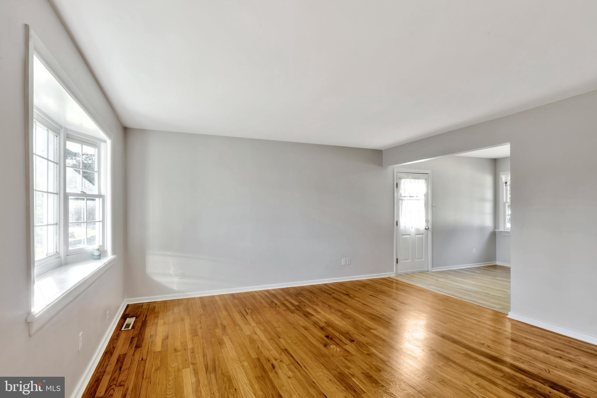 141 Kenmark Road Newark, DE 19713 - Photo 6 of 22 Living room with refinished floors