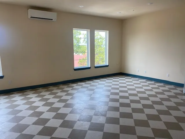 a view of an empty room and window