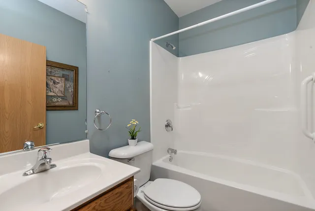 a bathroom with a sink toilet and bathtub