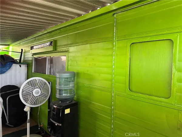 a kitchen with stainless steel appliances granite countertop a refrigerator stove and sink