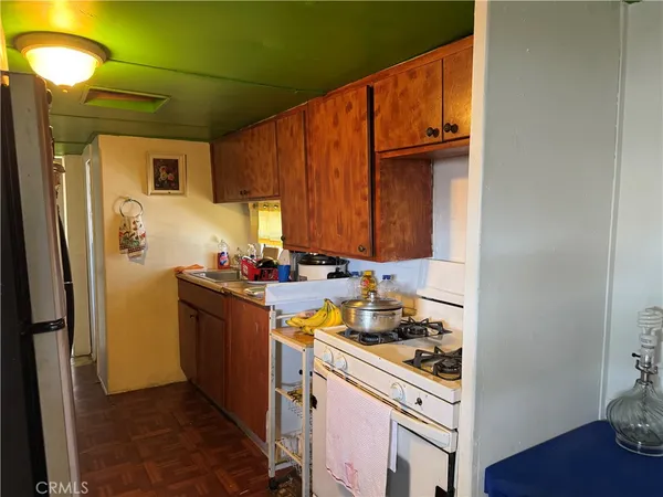 a room with furniture and a lamp