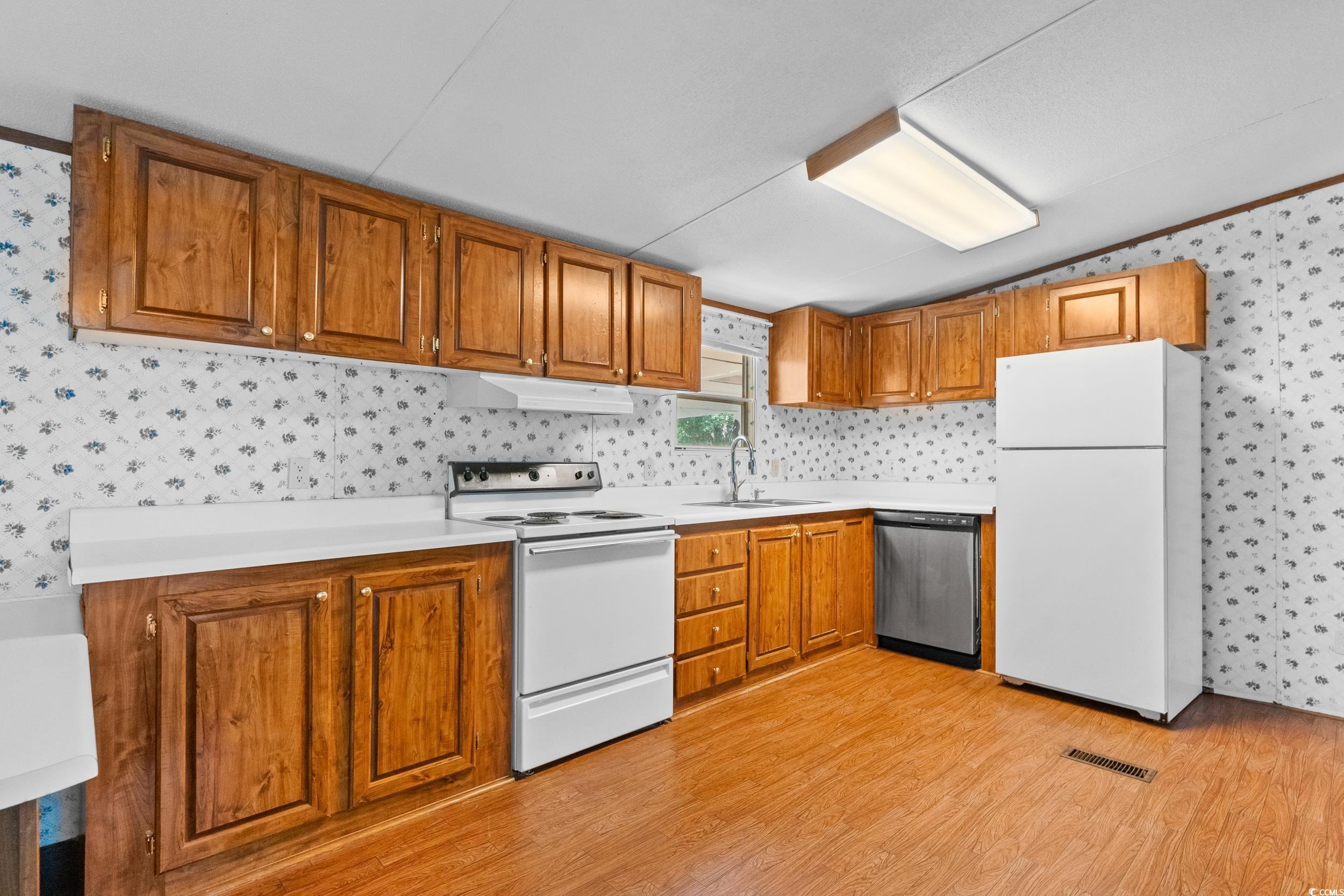 1731 Mineral Springs Road Conway, SC 29527 - Photo 20 of 38 Kitchen featuring light hardwood / wood-style floo