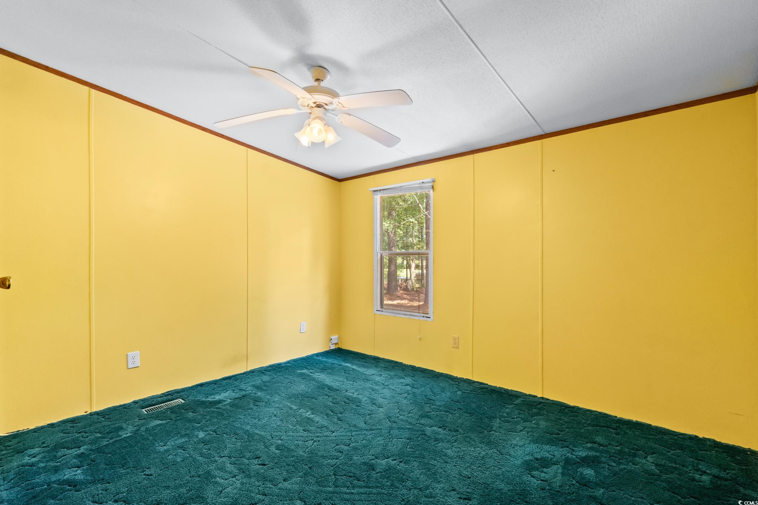 1731 Mineral Springs Road Conway, SC 29527 - Photo 28 of 38 Unfurnished room with lofted ceiling, crown moldin