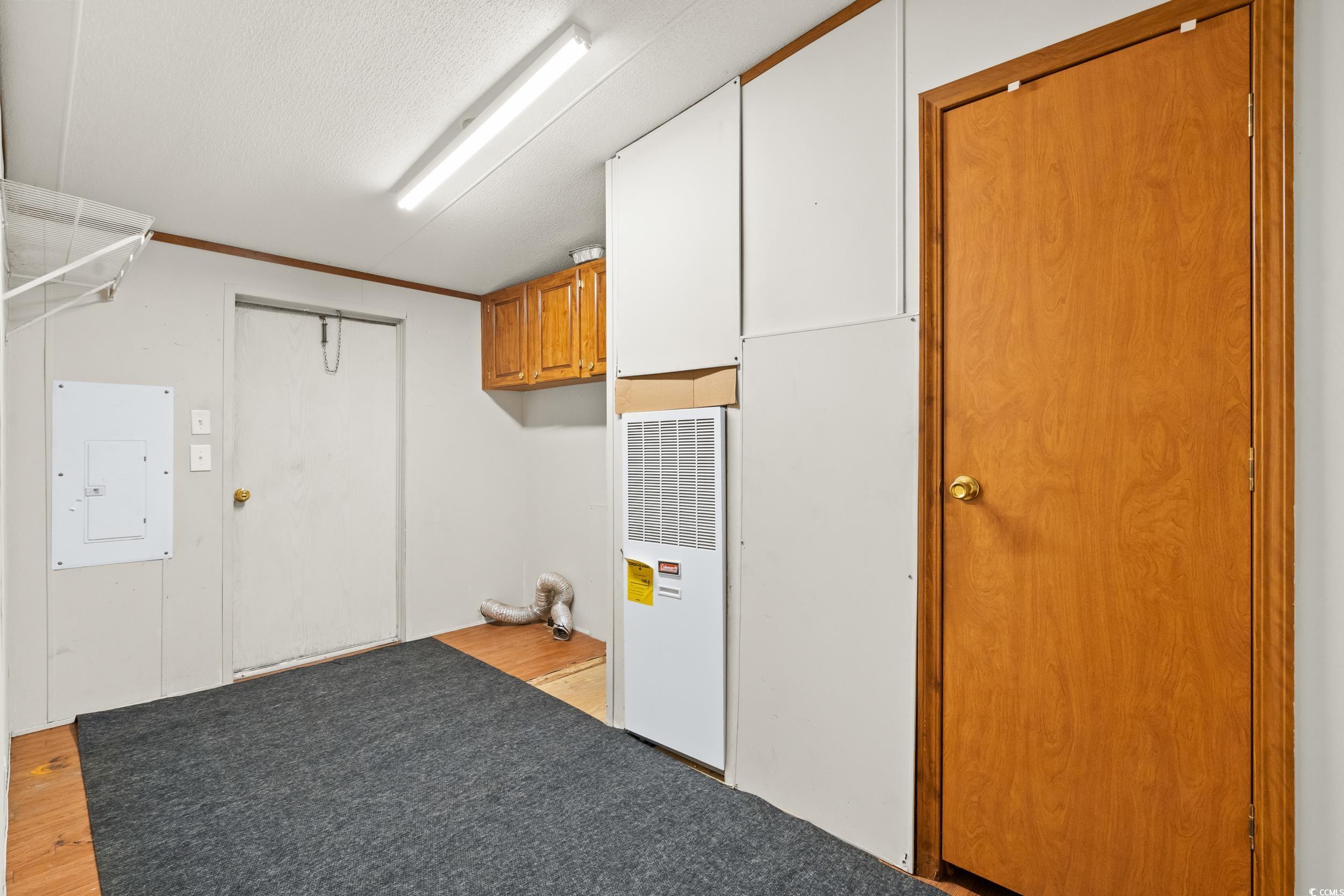 1731 Mineral Springs Road Conway, SC 29527 - Photo 31 of 38 Laundry room featuring electric panel and light wo
