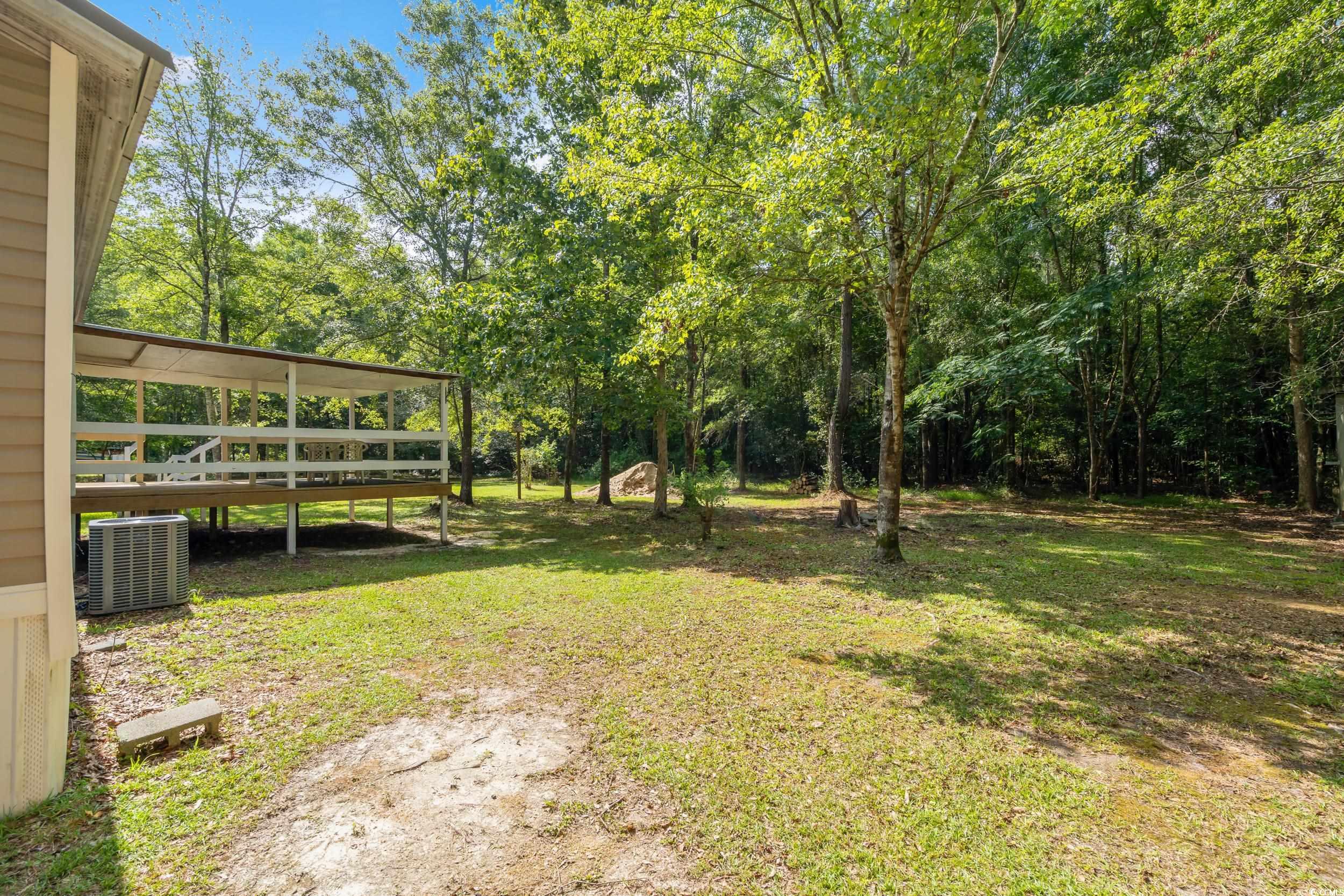 1731 Mineral Springs Road Conway, SC 29527 - Photo 10 of 38 View of yard featuring central AC unit