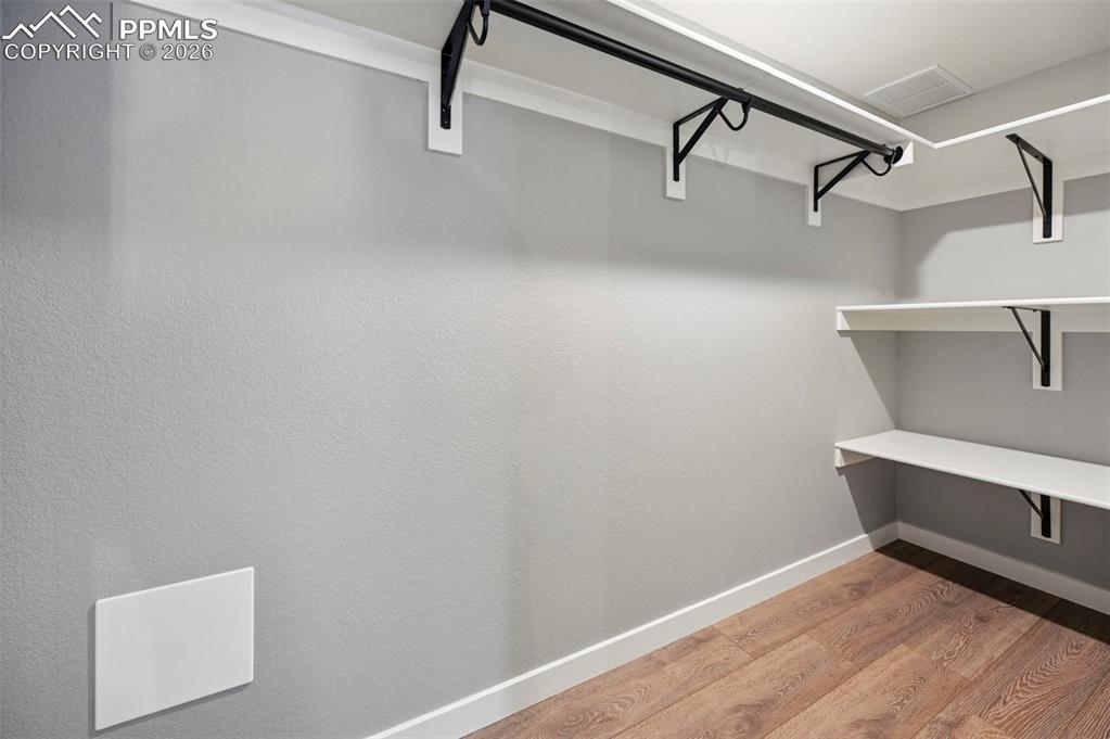 15945 Little Bluestem Road Monument, CO 80132 - Photo 35 of 49 a view of a room with racks on the wall