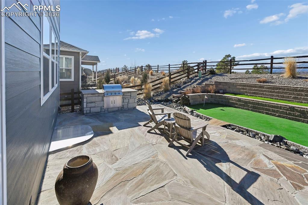 15945 Little Bluestem Road Monument, CO 80132 - Photo 39 of 49 a view of a terrace with chairs
