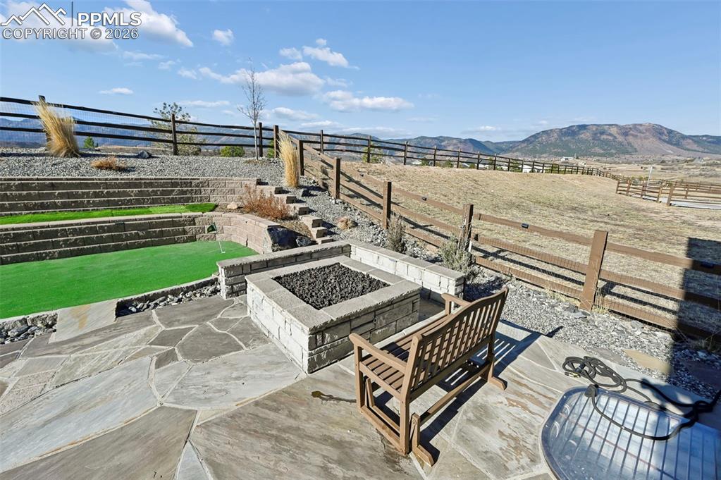 15945 Little Bluestem Road Monument, CO 80132 - Photo 40 of 49 a view of a terrace with chairs