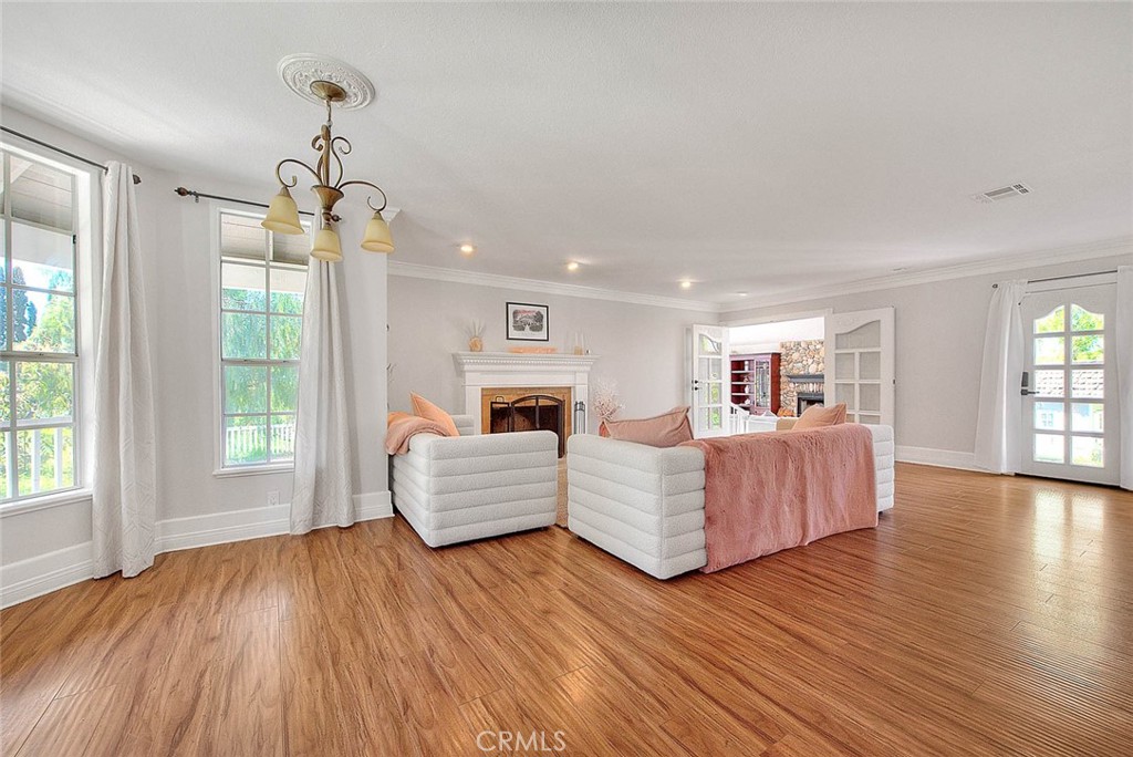 750 Jericho Drive Fallbrook, CA 92028 - Photo 13 of 74 a living room with furniture and wooden floor
