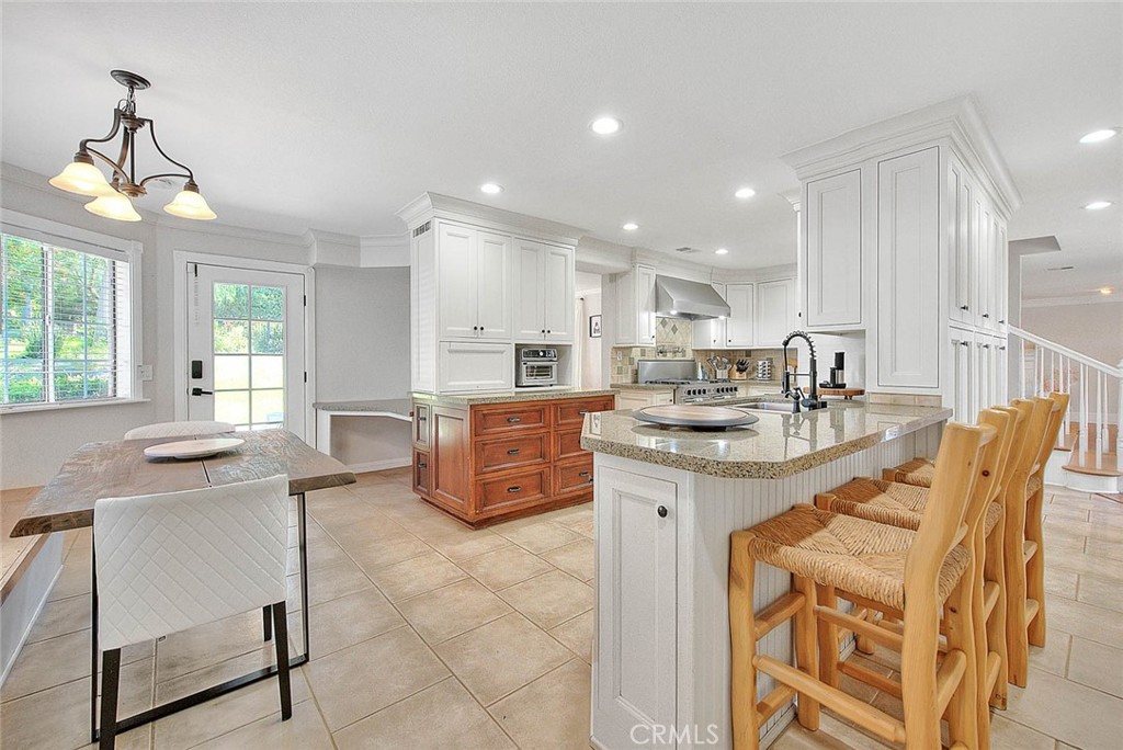 750 Jericho Drive Fallbrook, CA 92028 - Photo 19 of 74 a kitchen with counter top space cabinets and appliances