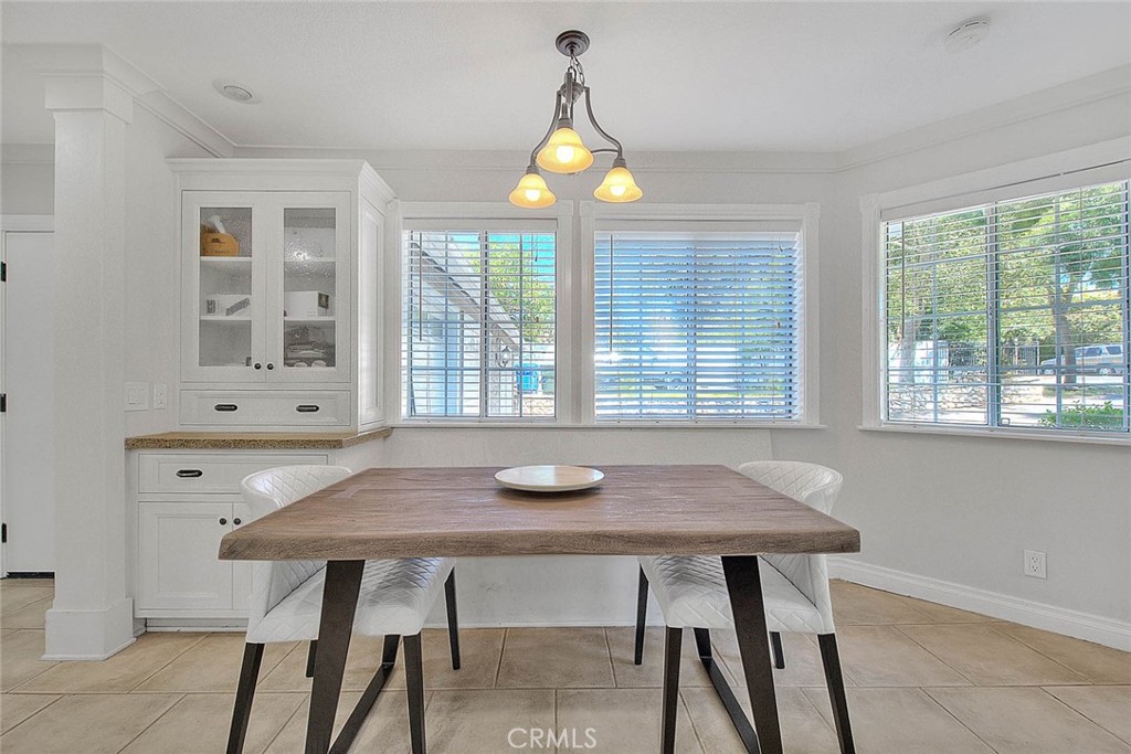 750 Jericho Drive Fallbrook, CA 92028 - Photo 28 of 74 a view of a dining room with a table and chairs