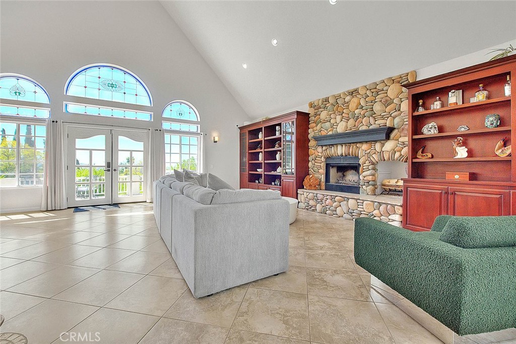 750 Jericho Drive Fallbrook, CA 92028 - Photo 31 of 74 a living room with furniture and a large window