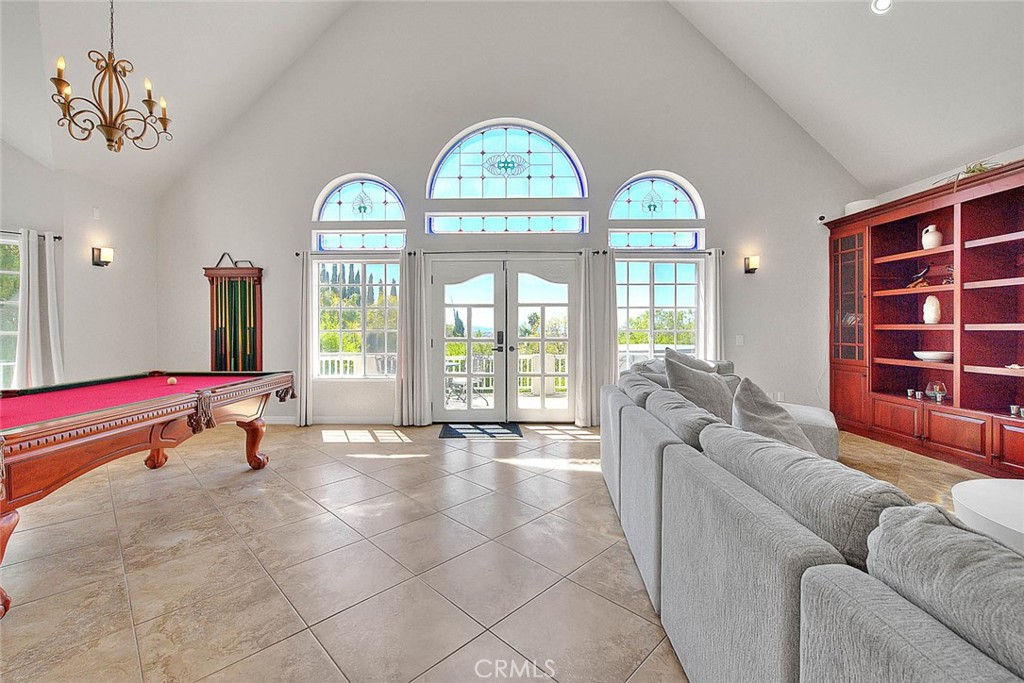 750 Jericho Drive Fallbrook, CA 92028 - Photo 32 of 74 a living room with furniture and a large window