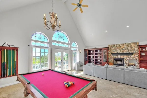 a spacious bathroom with a granite countertop sink a mirror and a