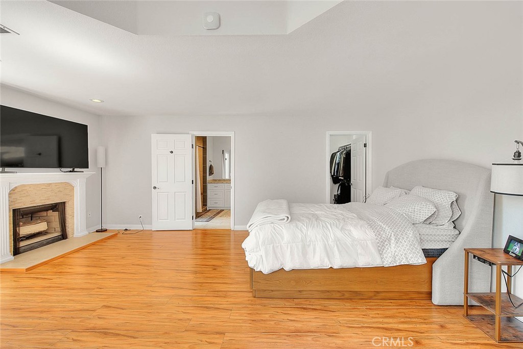 750 Jericho Drive Fallbrook, CA 92028 - Photo 43 of 74 a bedroom with a bed and a flat screen tv