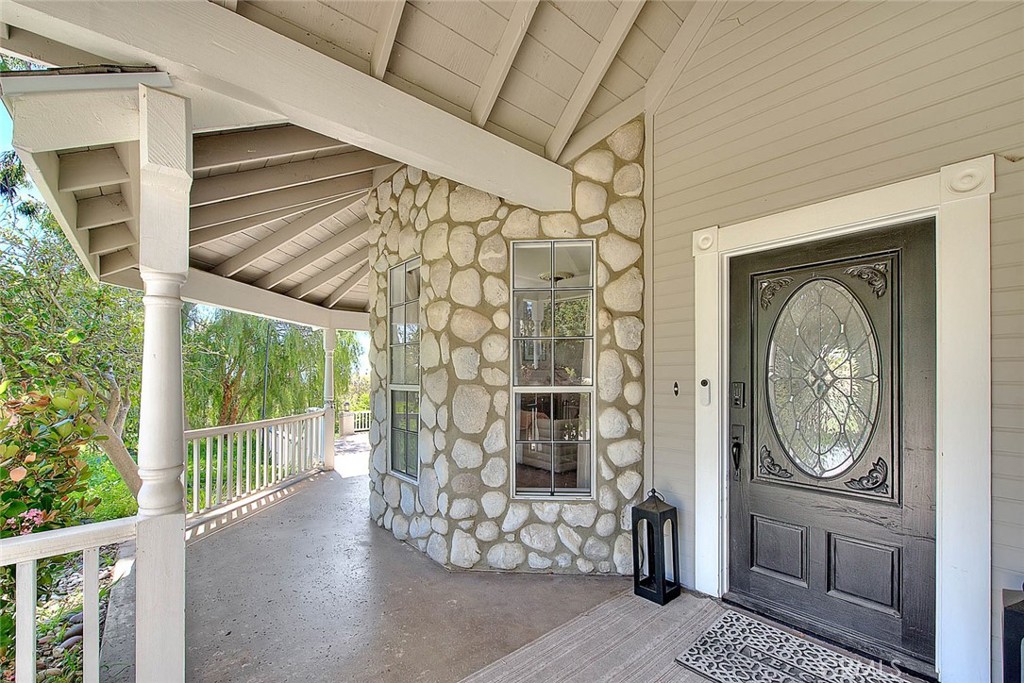 750 Jericho Drive Fallbrook, CA 92028 - Photo 6 of 74 a view of a hallway with wooden floor and a window