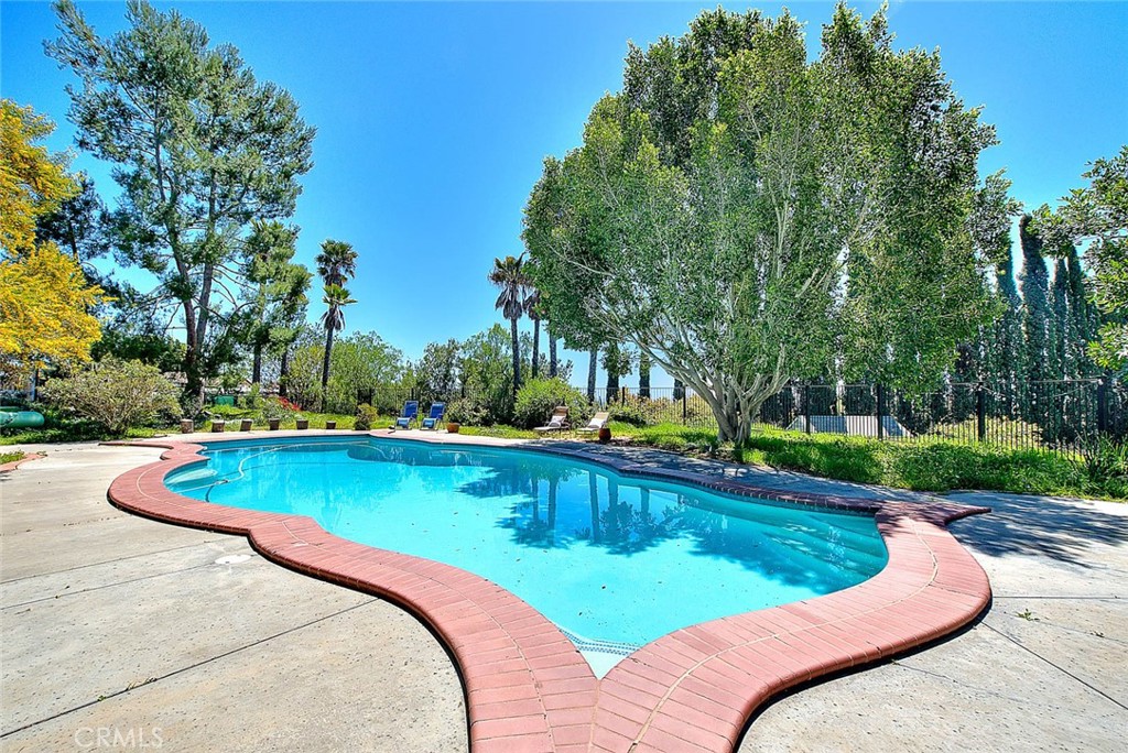 750 Jericho Drive Fallbrook, CA 92028 - Photo 63 of 74 a view of a swimming pool with a patio