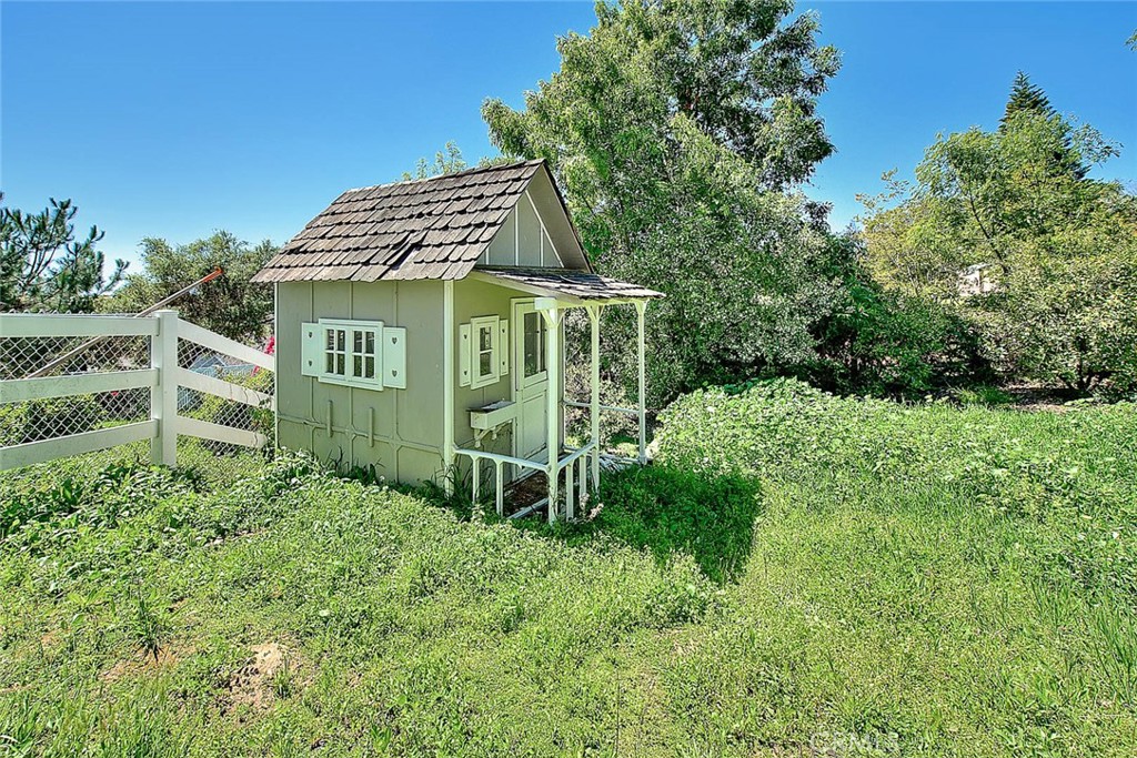 750 Jericho Drive Fallbrook, CA 92028 - Photo 66 of 74 a view of a house with a yard and plants