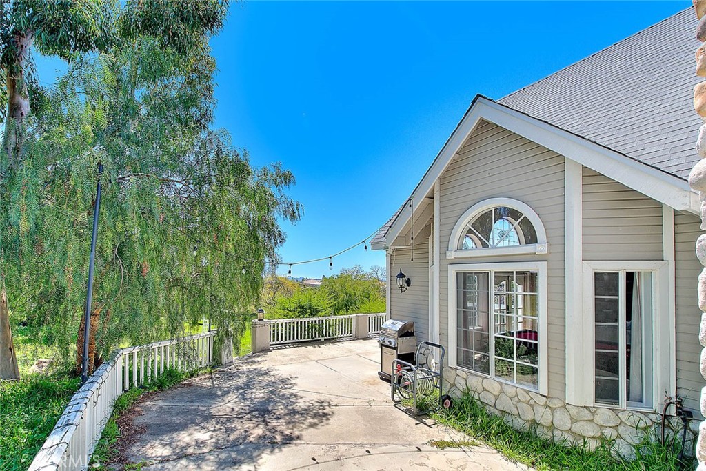 750 Jericho Drive Fallbrook, CA 92028 - Photo 10 of 74 a view of a house with a small yard and plants