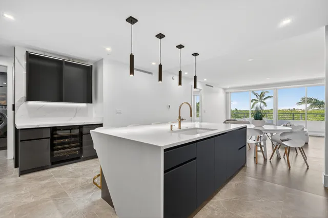 a white bath tub sitting next to a white toilet