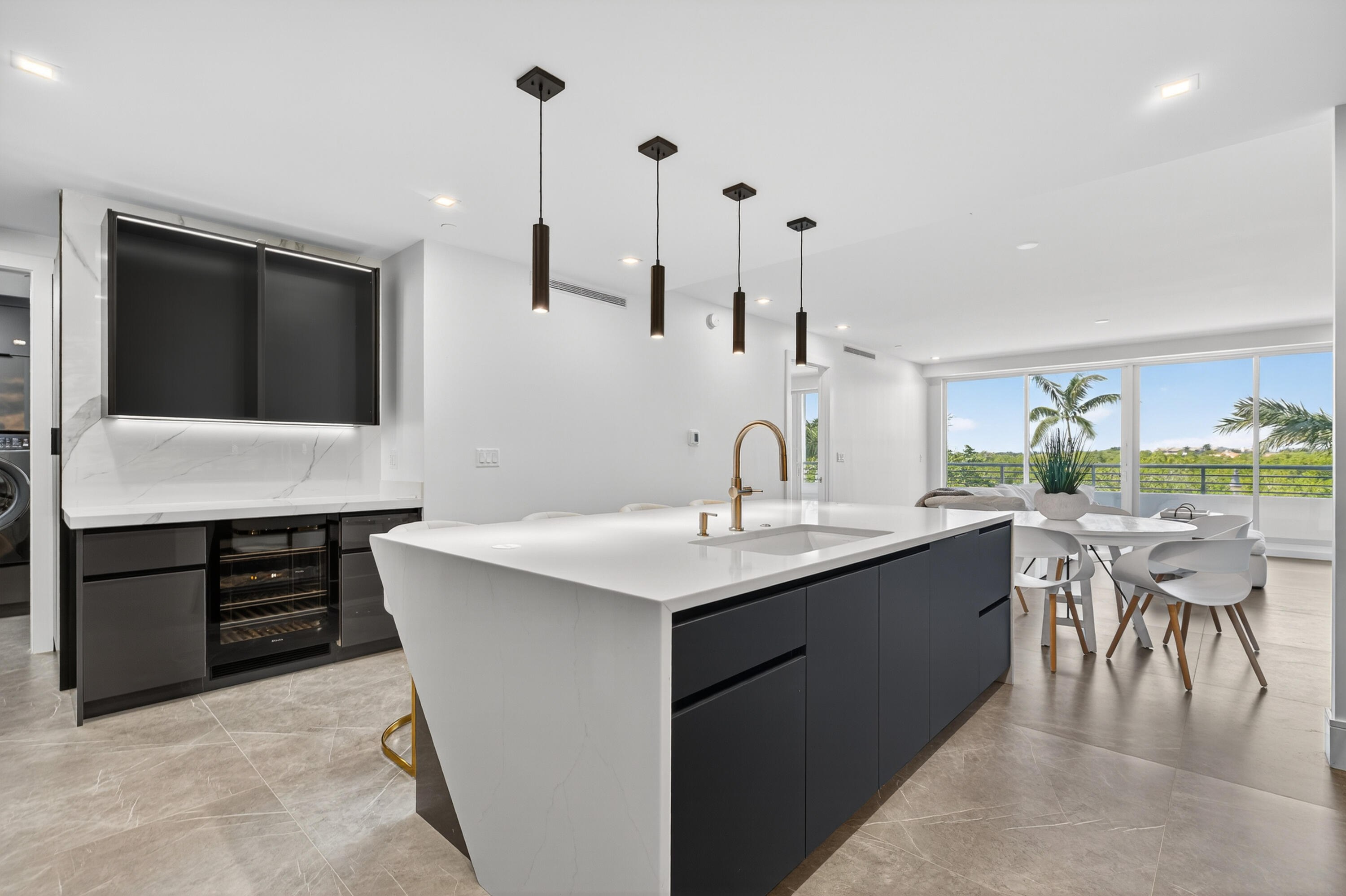 1 South Coastal Way, Unit 205 Jupiter, FL 33477 - Photo 13 of 67 a kitchen with a sink and stove