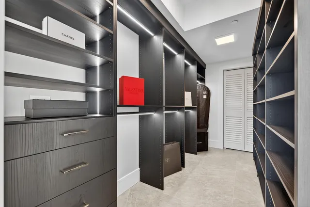 a front view of a building with a lot of windows