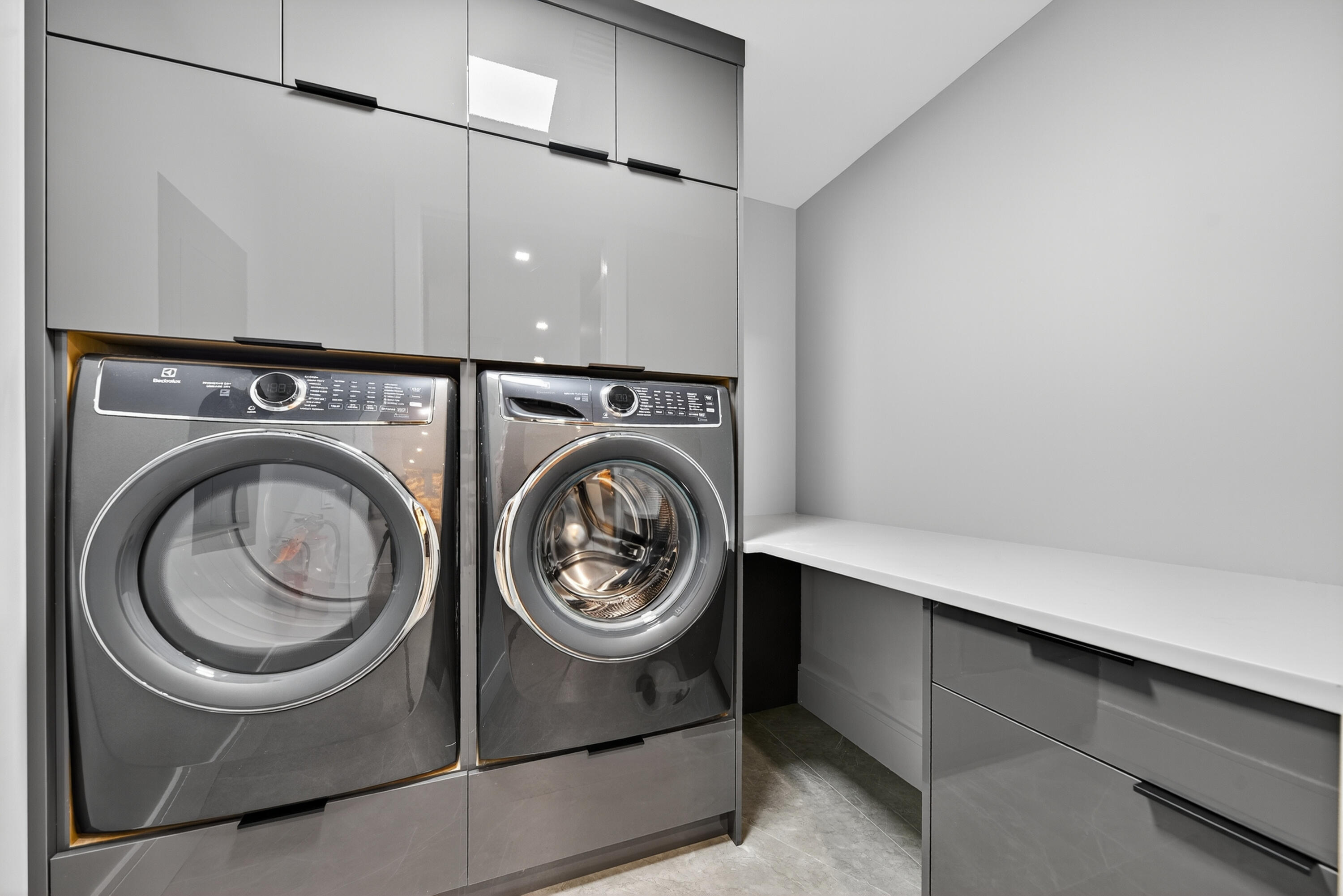 1 South Coastal Way, Unit 205 Jupiter, FL 33477 - Photo 22 of 67 a utility room with dryer and washer